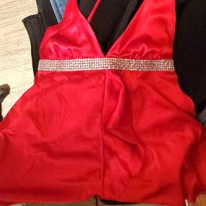 Beautiful rich red blouse with fake diamonds